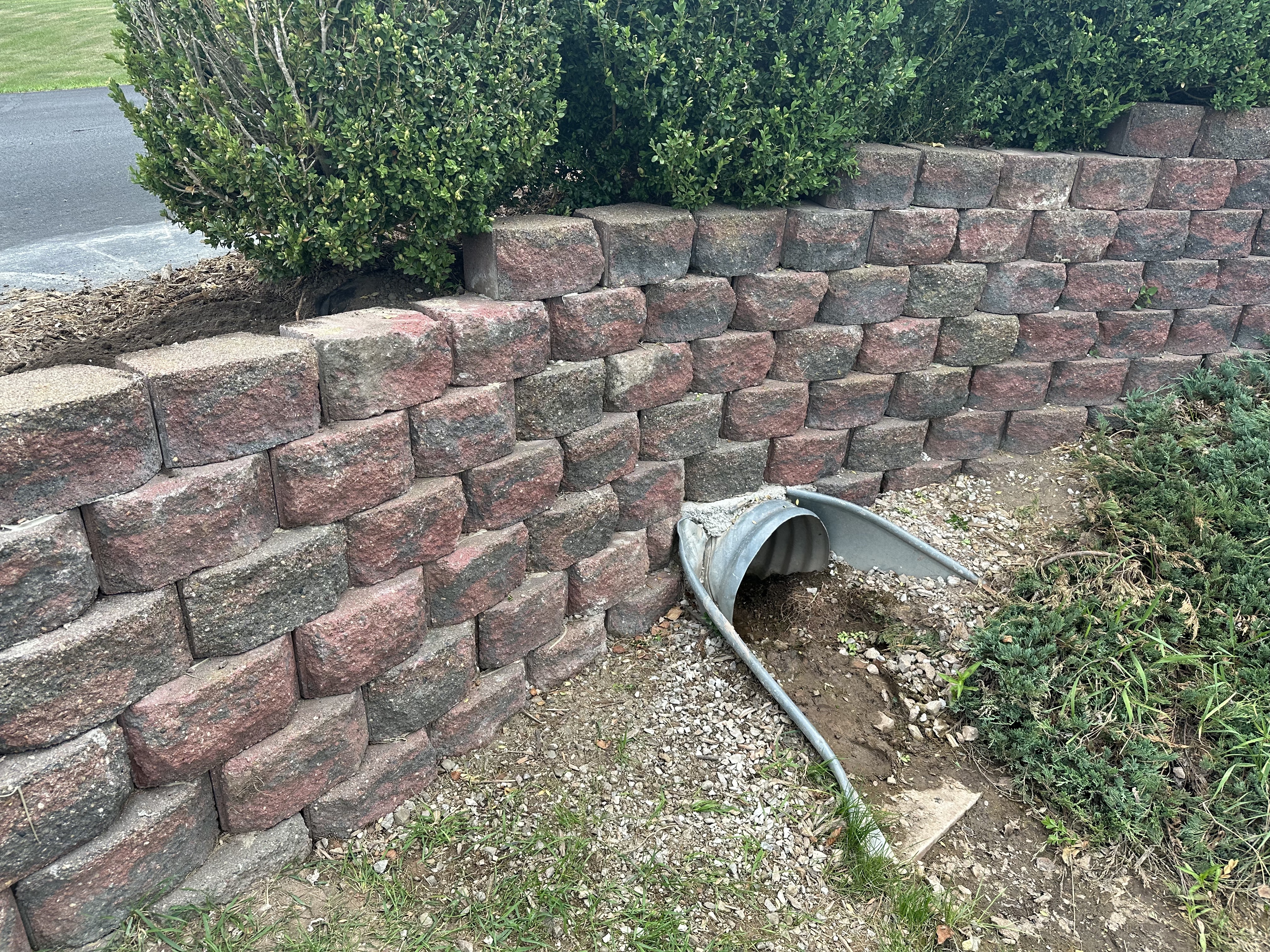 Retaining wall installation by Precision Property Works